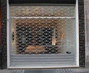 Cambio molla serranda negozio costo Monza