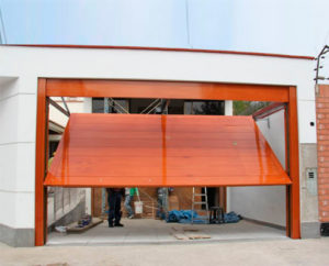 Riparazione porte basculanti Bregnano